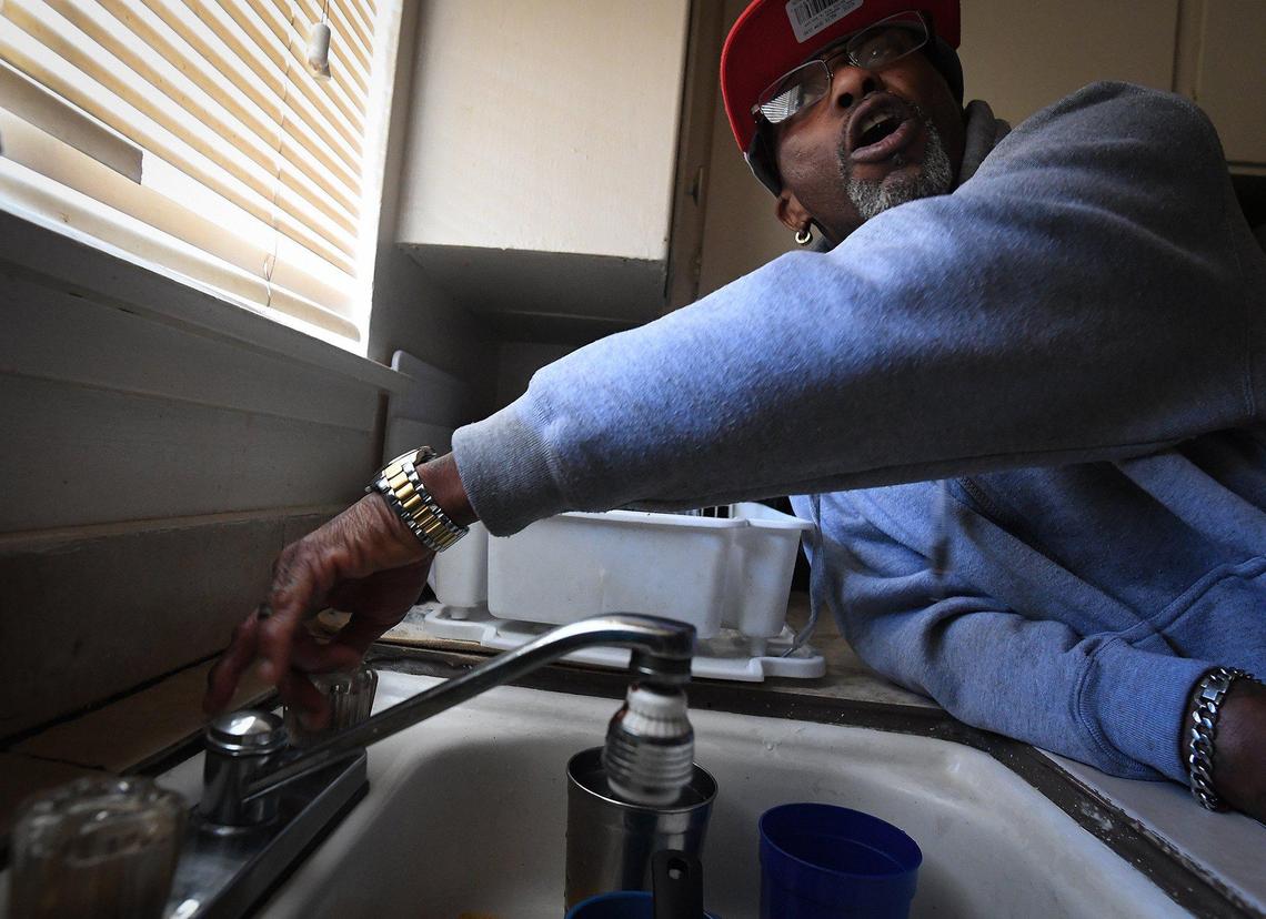 Without warning, the water in Claudio Hughes apartment was turned off, he said during an interview, Feb. 17, 2021. This has happened several times in the past without warning. One neighbor, Melissa Tepezano, said that residents had to resort to filling buckets of water from outside faucets for use in their apartments, such as flushing toilets. Hughes said last year he went 68 days without a working stove.