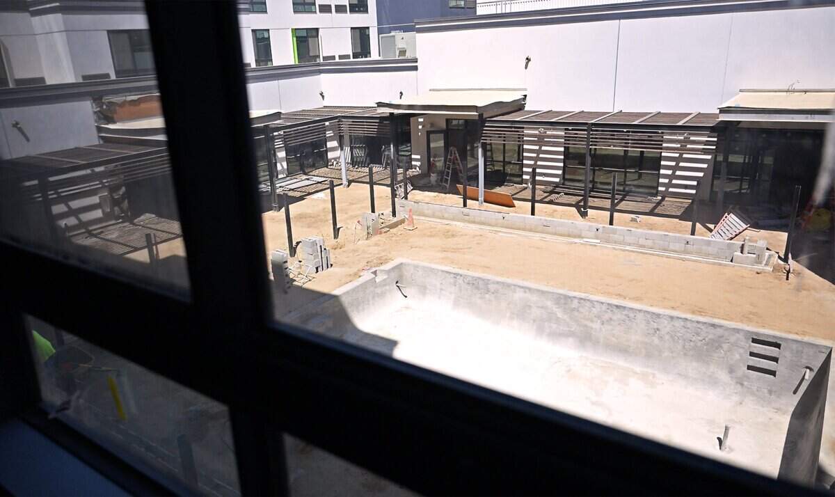 The courtyard pool is seen from a second-floor room at the new Courtyard by Marriott Downtown Fresno, under construction on M Street next to the Fresno Convention Center Wednesday, June 24, 2026, in downtown Fresno.