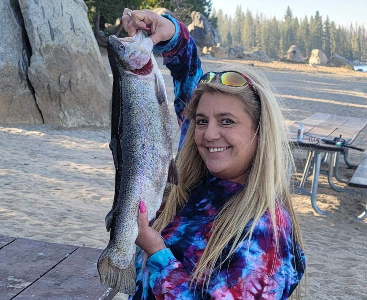 Christi Avakian borrowed her father’s fishing pole and scored her first catch, a 6.6-pound rainbow trout at Shaver Lake.
