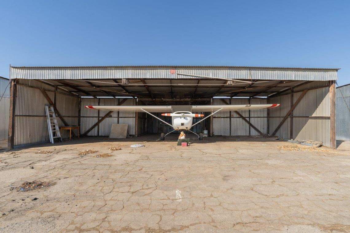 Eckert Field, a small airport facility in the small South Valley town of Strathmore, is for sale for $1.275 million. The airport is still active and can be used by the public. Six of the 20 hangars are currently leased.