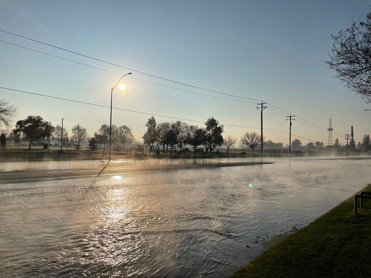A section of Brawley Avenue, near Jaswant Singh Khalra Neighborhood Park, was flooded by a broken water main.