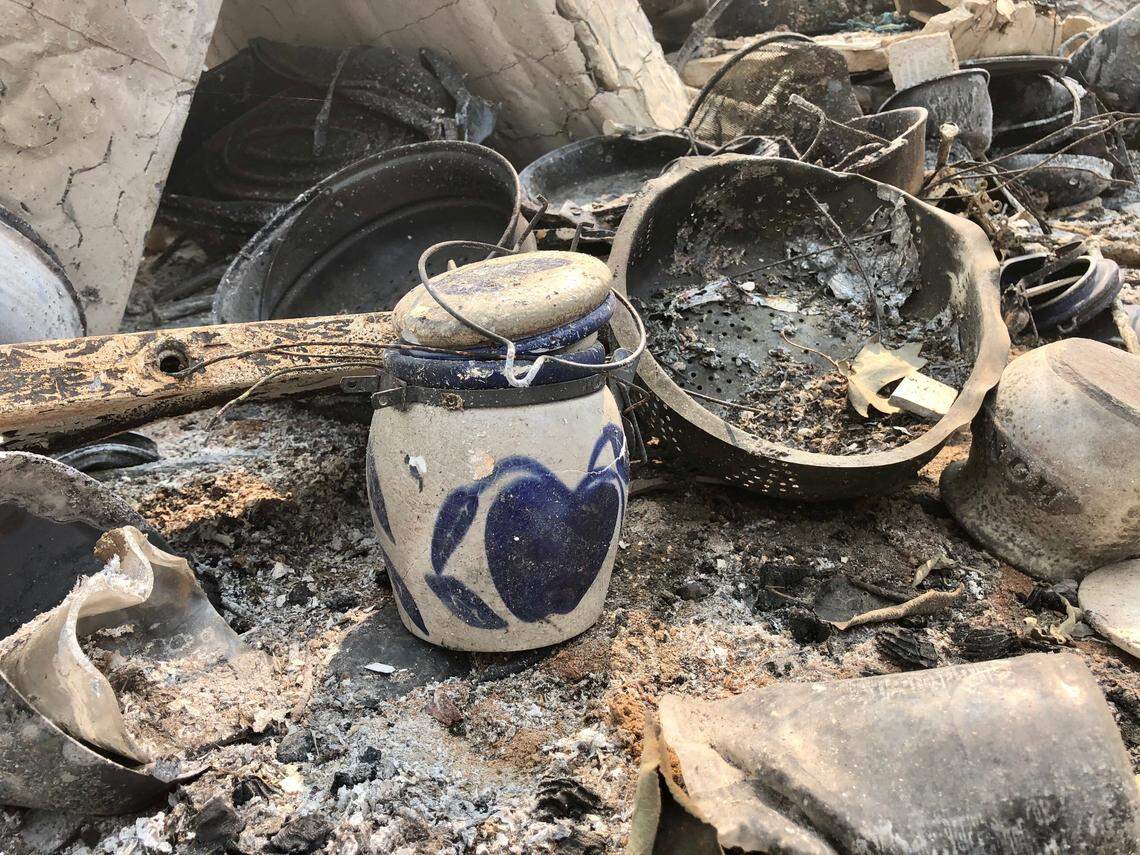 This jar, given to Gloria Sprague as a present by one of her sons who died in March, is one of few items in the ruins of her home destroyed by the Creek Fire that wasn’t burnt black.