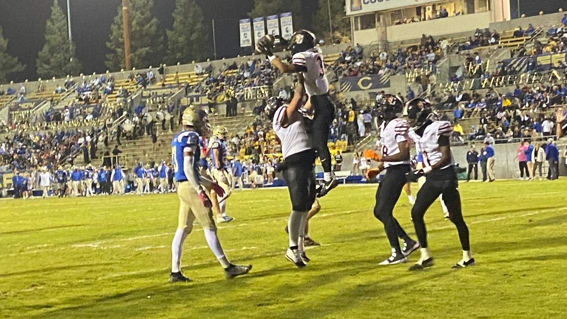 Central wide receiver Daylon Scott is hoisted after scoring a touchdown against Clovis on Thursday, Oct. 24, 2024.