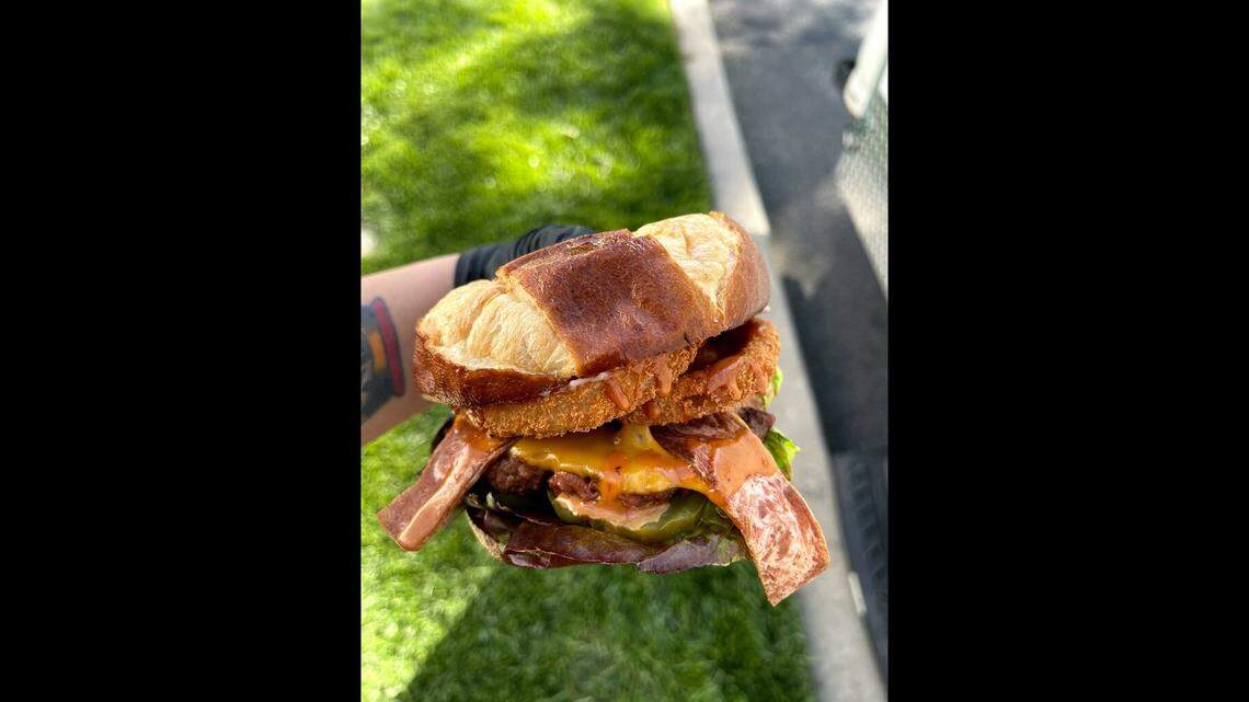 The campfire burger is the No. 1 seller at Plant Slayer, which is planning to open a restaurant downtown. The burger comes with bacon, onion rings, pickles and more, all of it vegan.