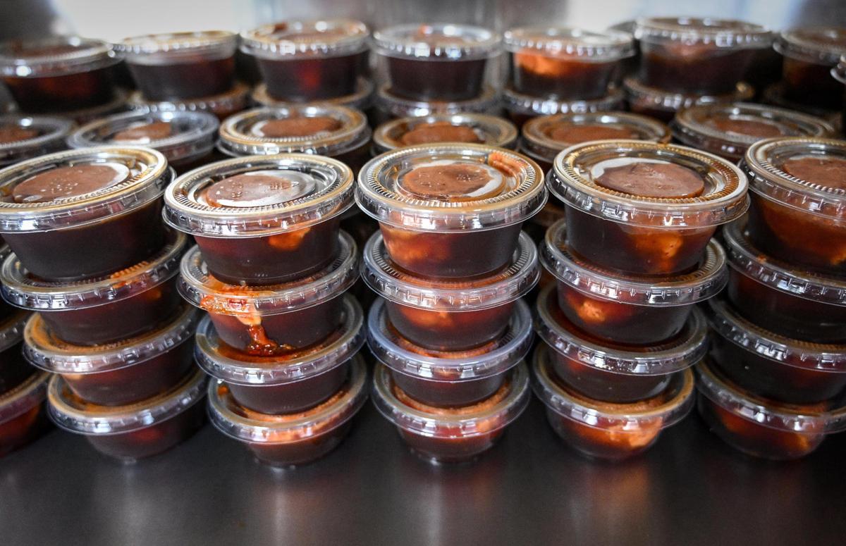 Spicy mayo sauce is set out for the day’s orders at Spicy Mayo Hibachi at their new restaurant on Shaw Avenue near West Avenue in Fresno on Tuesday, May 16, 2023.