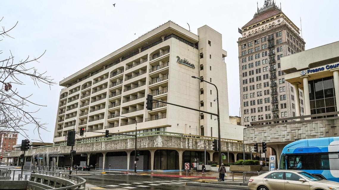 The Radisson Hotel building sits on Van Ness Avenue in downtown Fresno next to the taller Pacific Southwest Building. The City of Fresno shut down the hotel in late December due to code violations. It was announced Wednesday, March 29 that it has new ownership.