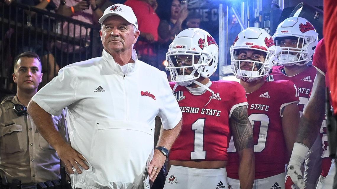 Fresno State coach Jeff Tedford waits to run onto the field with the team before the start of their game against Oregon State at Valley Children’s Stadium in Fresno on Saturday, Sept. 10, 2022.