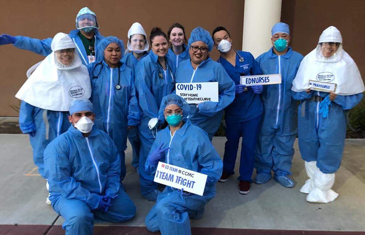 Health Care workers from Community Regional Medical Center gather for a photo.