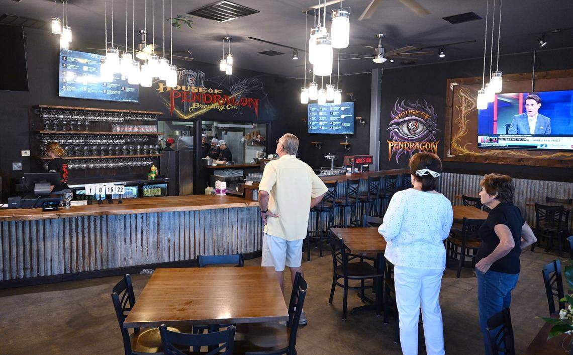 Guests visit House of Pendragon's new location on Pollasky Avenue during a closed special event as they prepare to hold a soft opening this weekend in Old Town Clovis. Photographed Thursday, July 31, 2025 in Clovis.