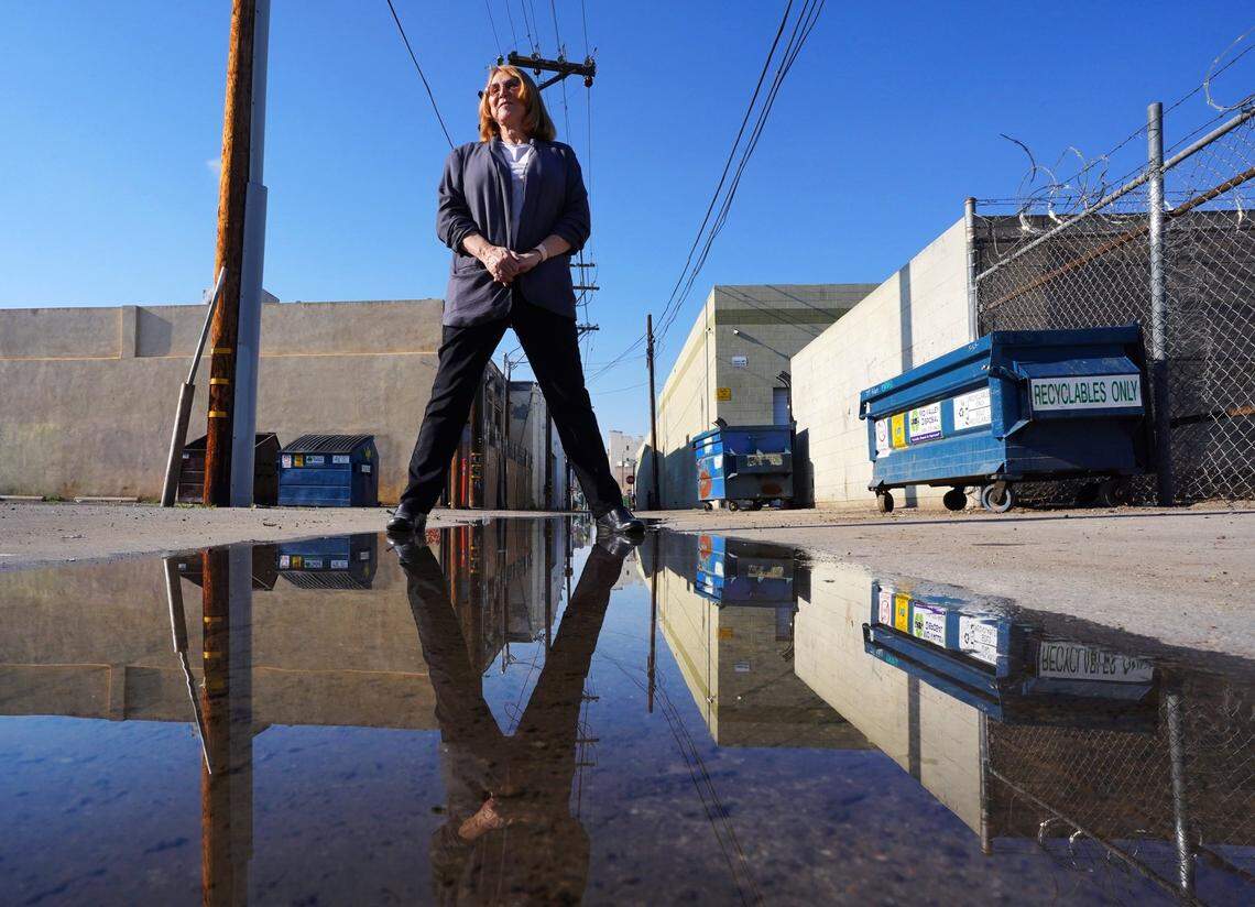 Nora Monaco of Monaco Enterprises, LLC, sees Fresno’s Brewery District on the cusp of great opportunities as buildings become available in downtown Fresno. Alleys like this could eventually be blocked off for events. Photographed Tuesday, Feb. 5, 2021.