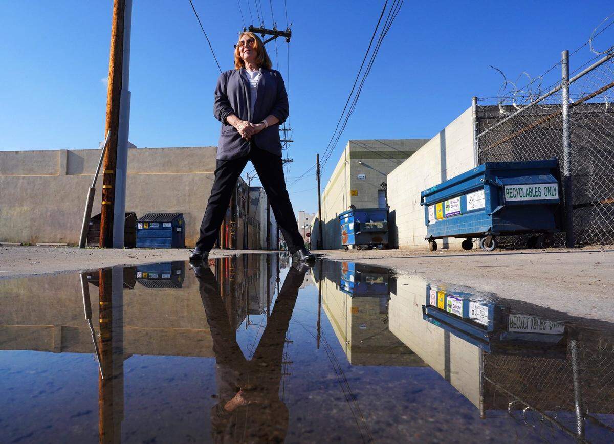 Nora Monaco of Monaco Enterprises, LLC, sees Fresno’s Brewery District on the cusp of great opportunities as buildings become available in downtown Fresno. Alleys like this could eventually be blocked off for events. Photographed Tuesday, Feb. 5, 2021.