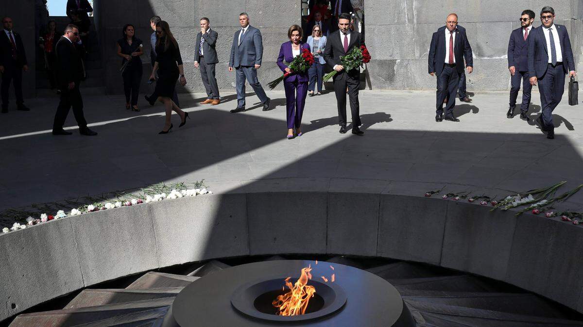 U.S. House Speaker Nancy Pelosi, center left, and head of Armenian National Assembly Alen Simonyan, center right, attend a wreath-laying ceremony at the monument to the victims of mass killings by Ottoman Turks during the massacre, in Yerevan, Armenia, Sunday, Sept. 18, 2022. Earlier an outburst of fighting with neighboring Azerbaijan killed more than 200 troops from both sides.