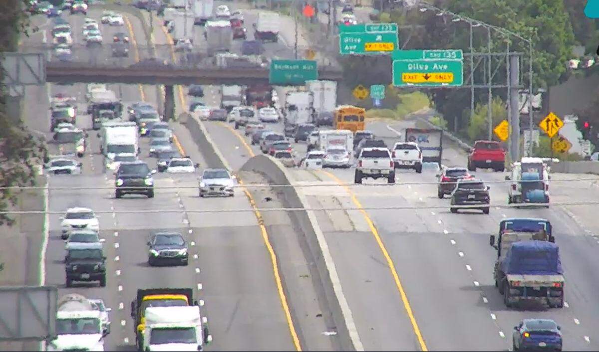 An image from a Caltrans camera shows traffic flowing on Highway 99 as seen looking south from Clinton Avenue on Tuesday, April 18, 2023. 
