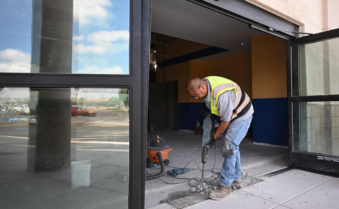 Kirkley Corporation Superintendent Francisco Alvarado breaks up the concrete at the front entrance to the new El Super Latin American grocery store being constructed in the former Manchester Center Sears. Photographed Monday, April 28, 2025 in Fresno.