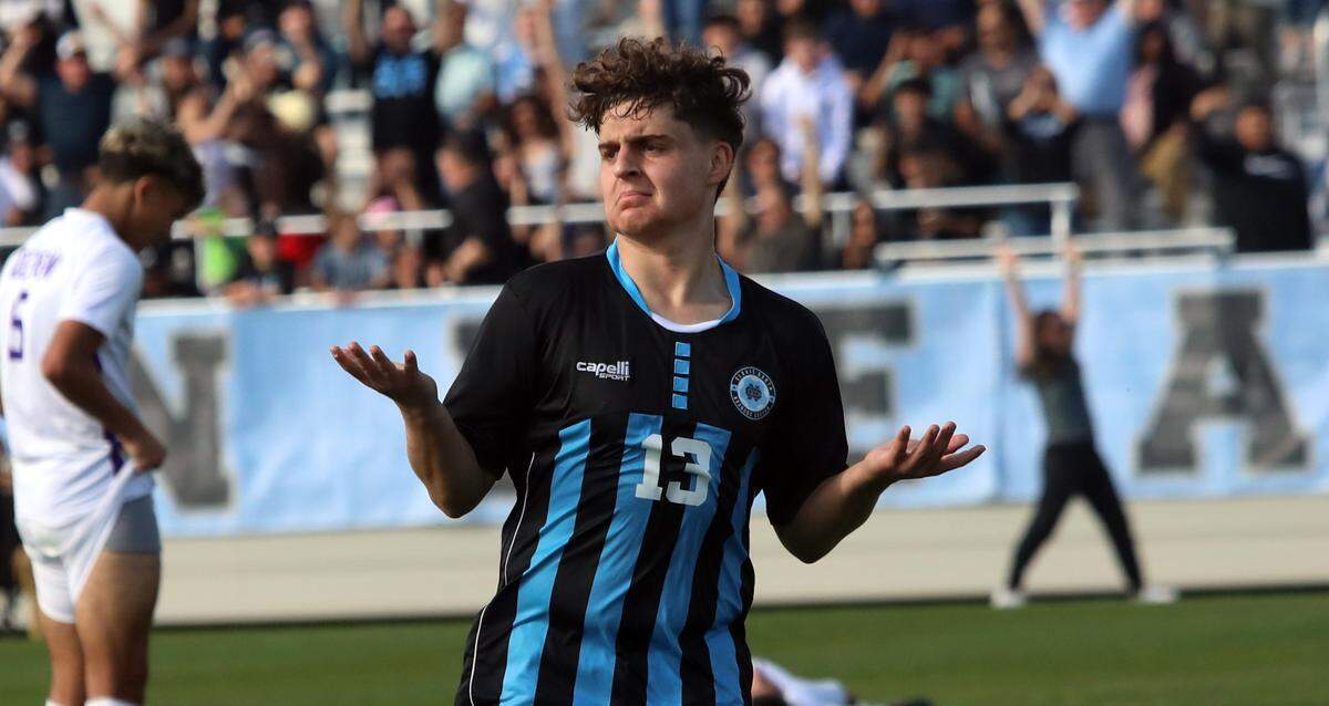 Clovis North junior midfielder Dylan Mostes reacts to his game-winning goal in the second period of overtime against Ridgeview High during the CIF Central Section Division I championship at Clovis East on Feb. 24, 2024. Clovis North won 3-2 (overtime) .