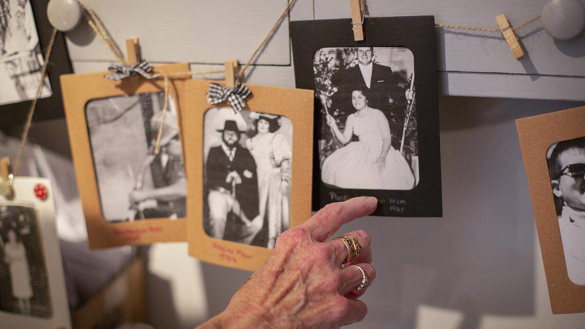 June 24 1961, is the date Susan married her now deceased husband, Harry “Punky” McClellan. The photos were put together by daughter Coreen during the time her father was residing in a nursing home. Susan recently strung the photos together and placed them in her bedroom, “this keeps me sane,” McClellan says. Dec 4, 2021. Photo by Julie Leopo for CalMatters