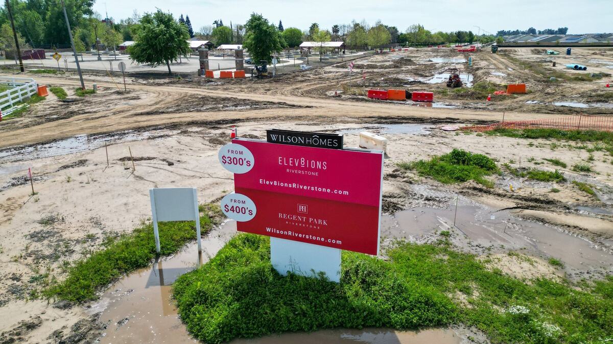 Wilson Homes are advertised on a billboard at the intersection of Sunnyside and Shepherd near the Dry Creek trailhead in Clovis on Wednesday, April 17, 2024.