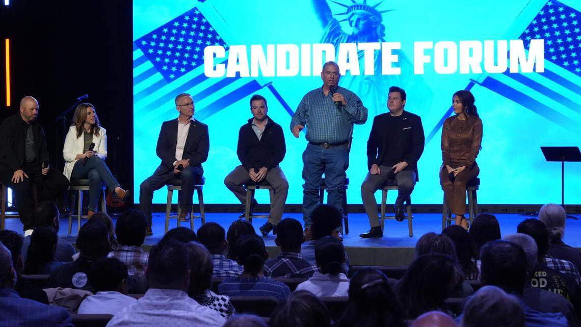 Tulare County board chairman Larry Micari, standing, made attacking comments against supervisor Eddie Valero during a candidate forum held at Legacy Church in Visalia Sunday morning. The forum did not include any Latino candidates.