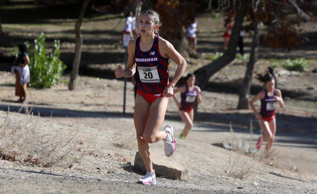 Buchanan High freshman Gaby Gutierrez approaches the final mile of the CIF Central Section Division I girls cross country race at Woodward Park on Nov. 21, 2024. Gutierrez finished second in 17:56.87 to help Buchanan to the team title.