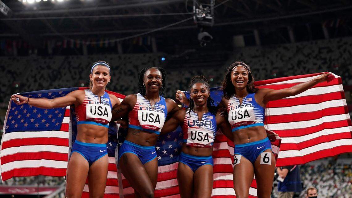 From left: Jenna Prandini, Teahna Daniels, Javianne Oliver and Gabrielle Thomas of the United States celebrate after winning the silver medal in the final of the women’s 4 x 100-meter relay at the 2020 Summer Olympics, Friday, Aug. 6, 2021, in Tokyo, Japan.
