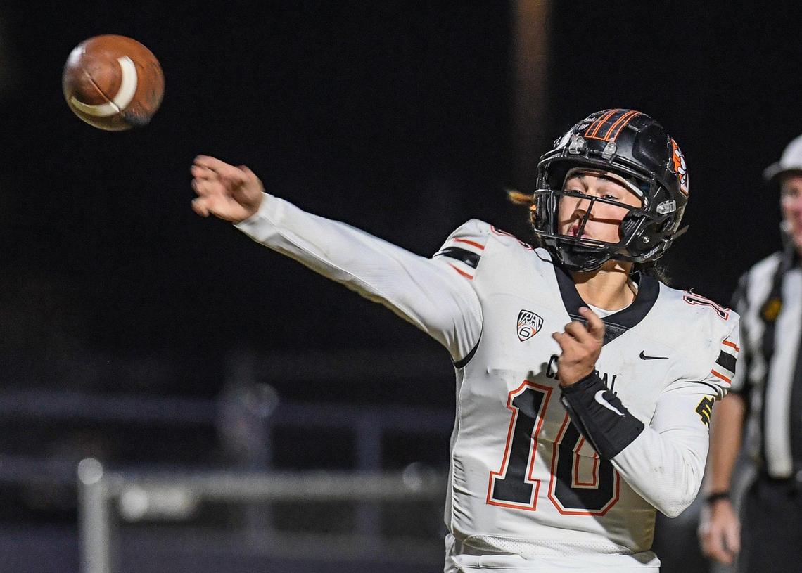 Central quarterback Dayton Tafoya throws downfield against Memorial in their Division I playoff game at San Joaquin Memorial on Thursday, Nov. 10, 2022.
