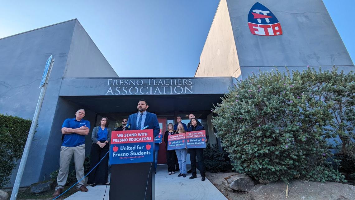 Fresno Teachers Association president Manuel Bonilla (center) publicly announced the union voted in favor of striking on Tuesday morning, Oct. 24, 2023 at the FTA’s offices in Fresno. The vote in favor allowed the FTA executive board (standing behind Bonilla) to decide Nov. 1 will be the start of educators’ picket lines if they and Fresno Unified School District don’t come to an agreement before then.