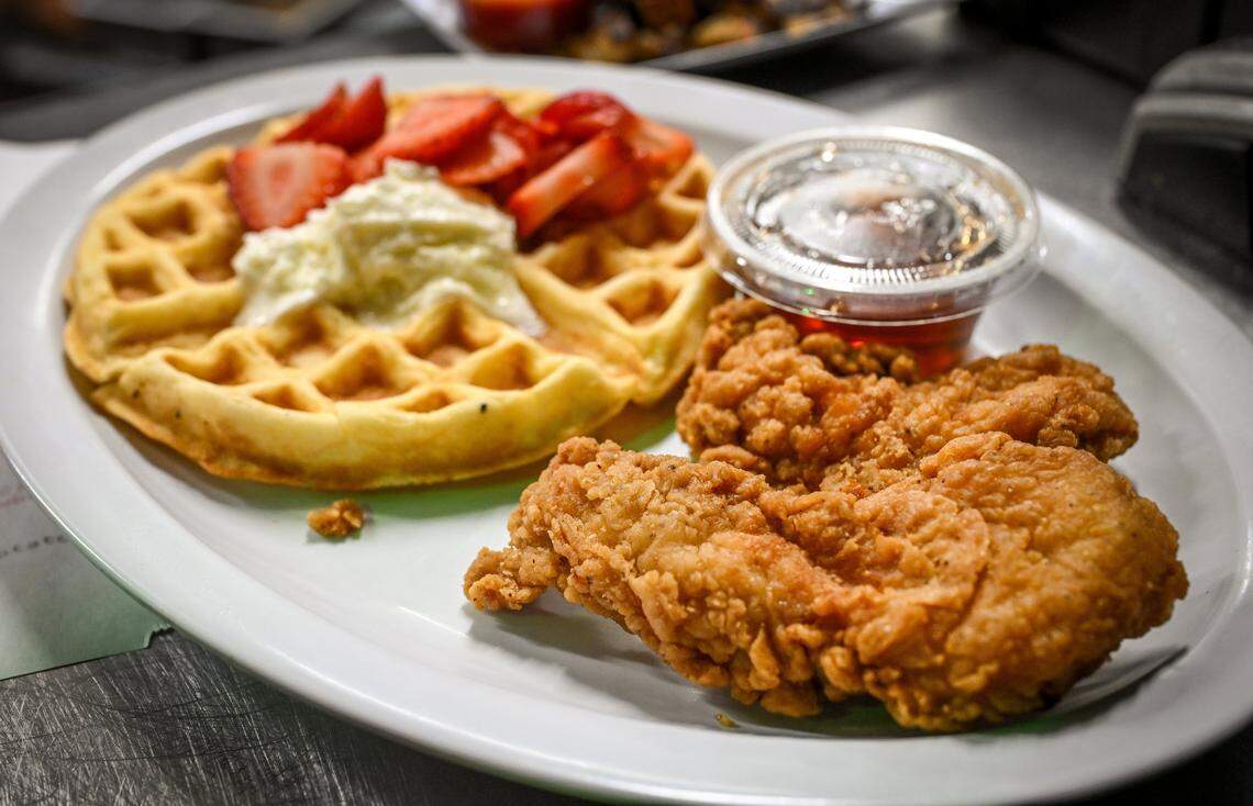 Chicken and waffles are one of the popular choices for brunch during Butta Brunch at Kocky's Bar & Grill in downtown Fresno but many are there for good times with friends, music and mimosa towers.