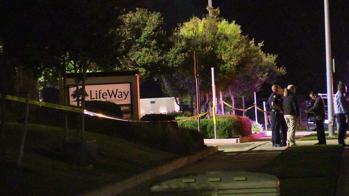 A gas station and church were blocked off Thursday, Oct. 5, 2023, while police investigated the scene where a Fresno police officer shot a man.
