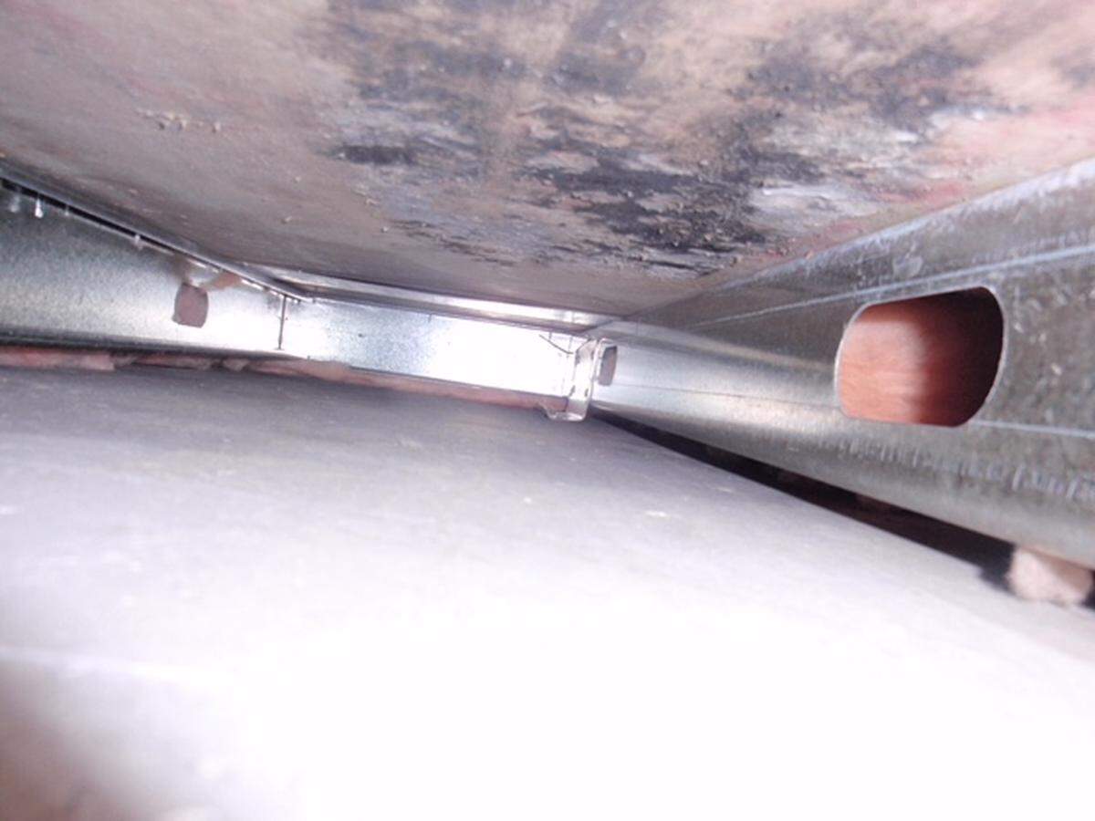 American Federaion of Government Employees Local 1237 released this photo showing mold under the floor of a control room at the federal prison in Mendota, California.