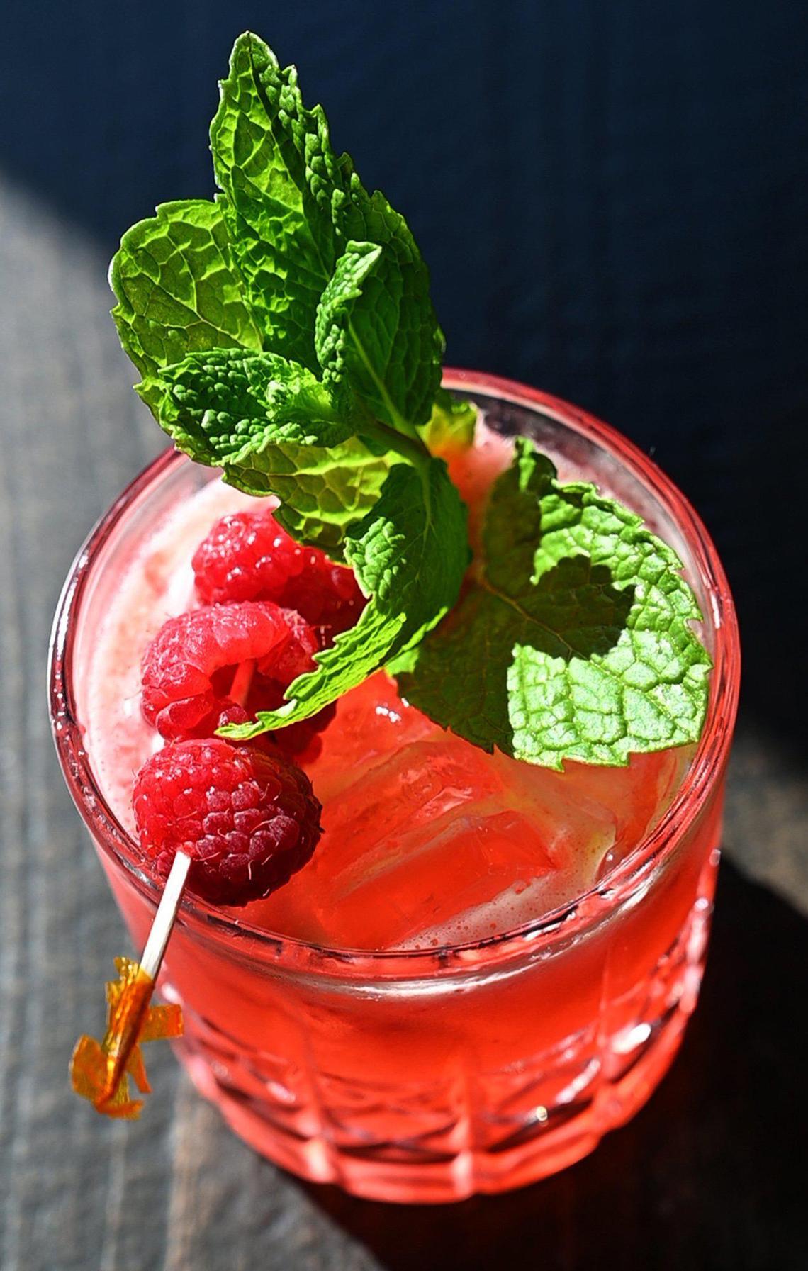 A mint and raspberry-topped Berry Bourbon Smash at the new Blast & Brew.