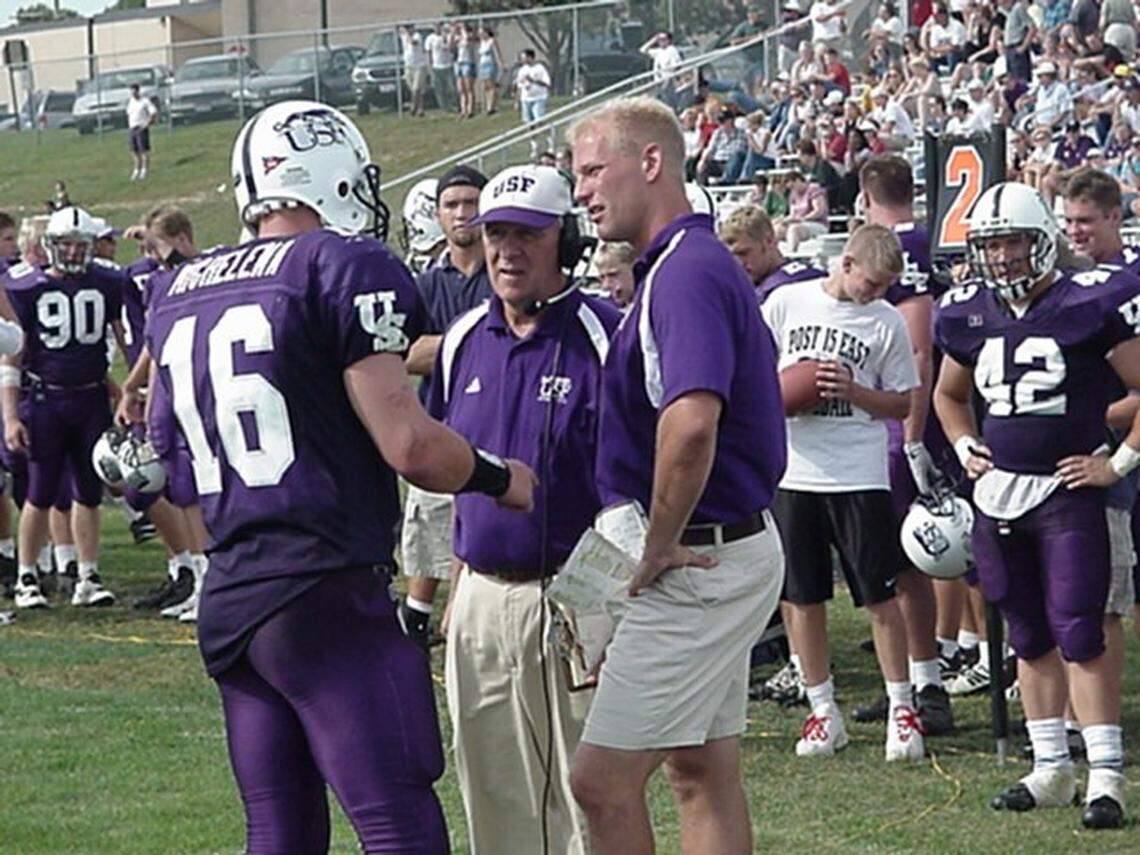 Fresno State coach Kalen DeBoer (right, in shorts) on the sidelines when the offensive coordinator at NAIA Sioux Falls.