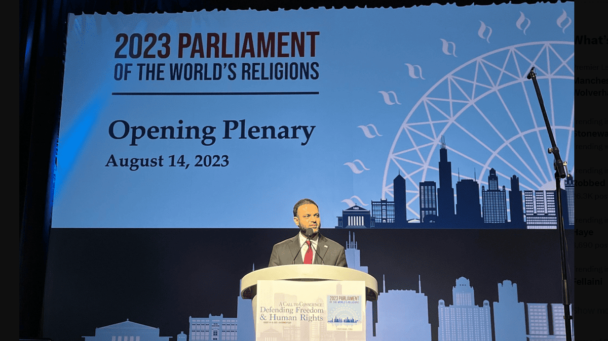 A speaker at the 2023 Parliament of World Religions in Chicago.