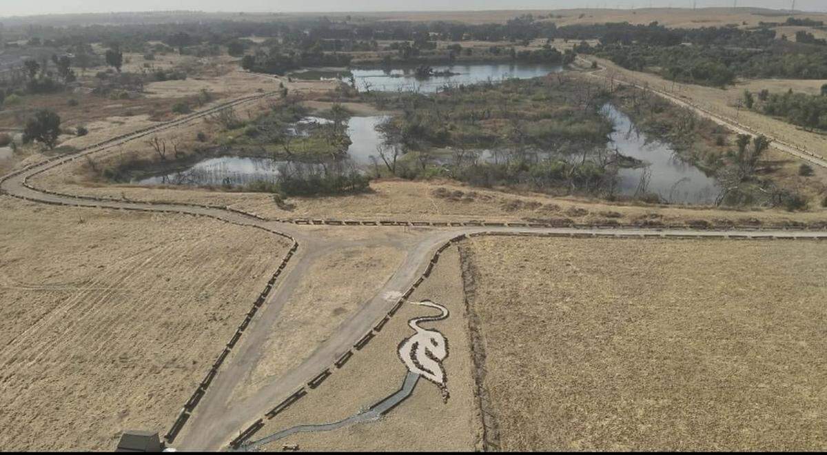 The newly built egret maze, roads lined by logs and the main pond can be seen in this aerial photograph of Ball Ranch. The 358-acre park located two miles of Fresno on Friant Road recently reopened to the public as an addition to the San Joaquin River Parkway.