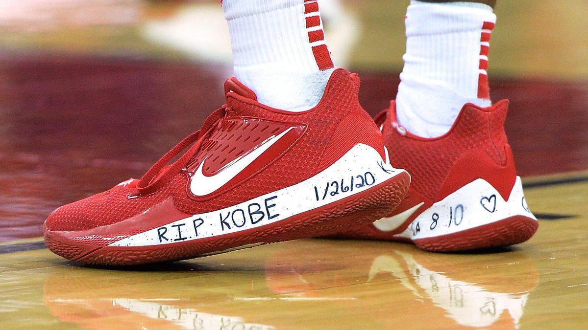 Fresno State freshman Anthony Holland wears shoes with hand-written tributes to Los Angeles Lakers great Kobe Bryant during their Mountain West Conference game against New Mexico at the Save Mart Center in Fresno on Saturday, Feb. 1, 2020.