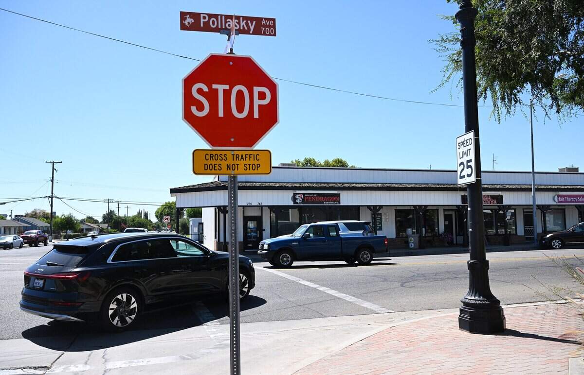 Traffic passes Pollasy Avenue and Eighth Avenue where House of Pendragon, center background, will hold a soft opening this weekend at its new location in Old Town Clovis. Photographed Thursday, July 31, 2025 in Clovis.
