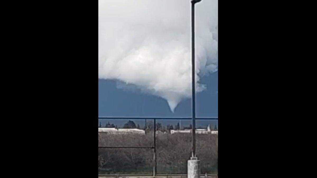 A funnel cloud appears in Madera County on Friday, March 1, 2024. A tornado warning was issued but has since expired.