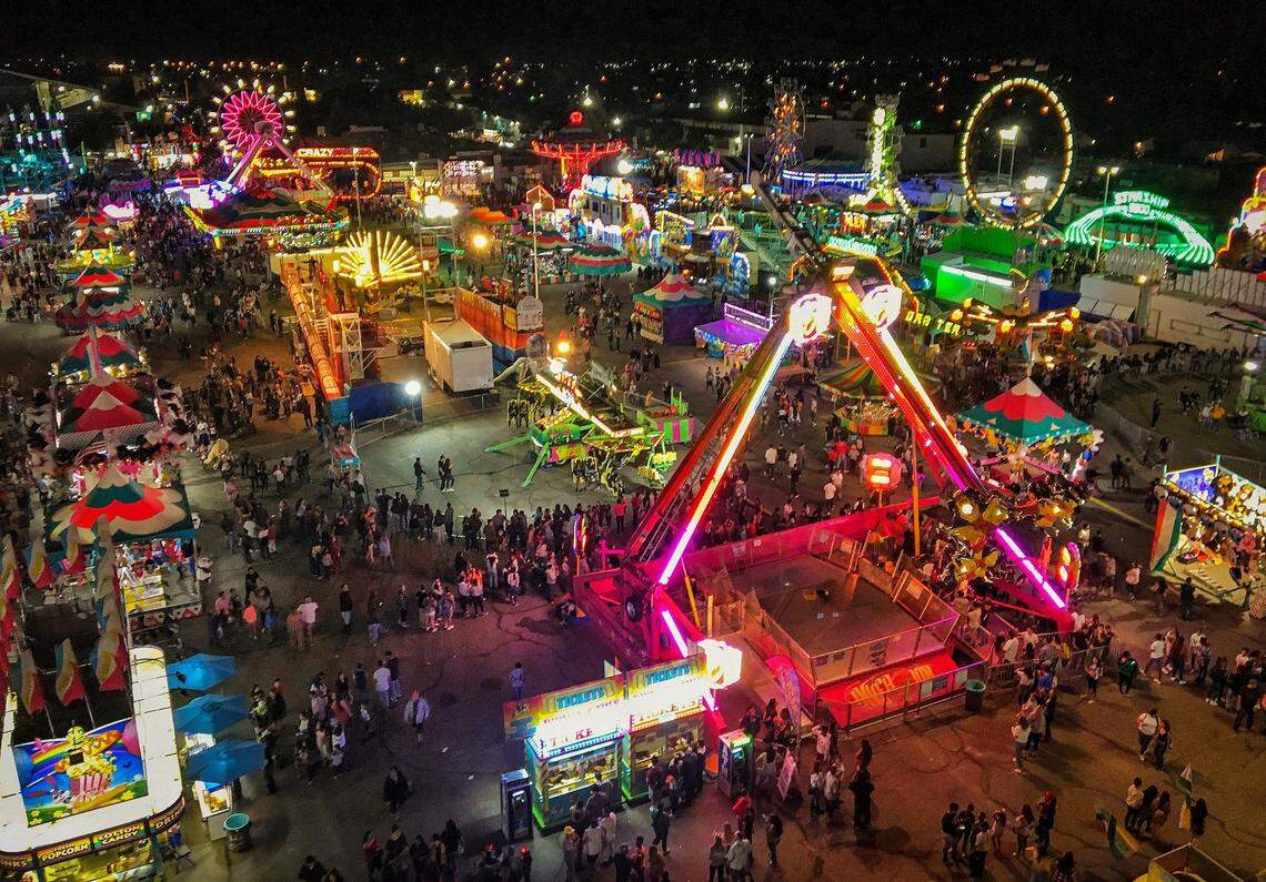 Carnival rides are lit up at night as seen at the 2018 Big Fresno Fair. This year’s fair starts a 12-day run Wednesday, Oct. 1.