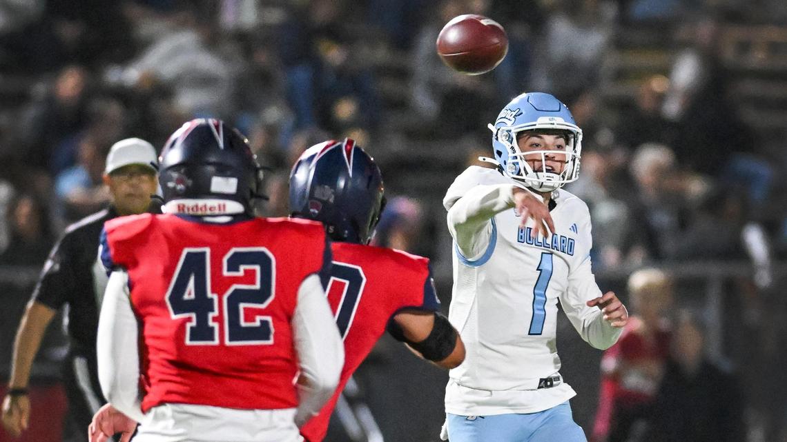 Bullard quarterback Tyler Franklin passes under pressure during the Knights’ game against Memorial at San Joaquin Memorial on Friday, Oct. 25, 2024.