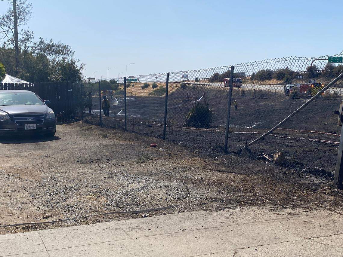 A home is seen after a grass fire came close on Saturday, June 21, 2025 in Fresno, California.