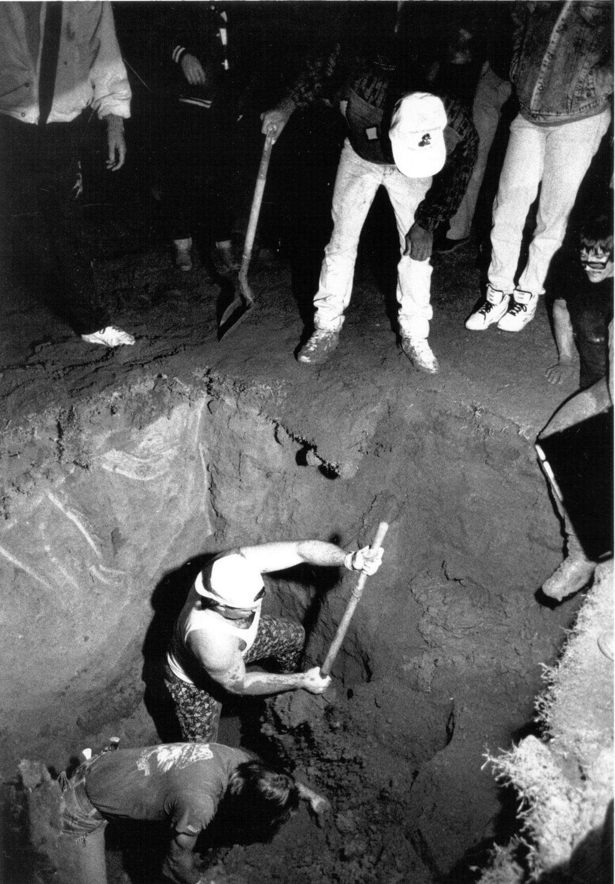 Workers try to rescue Fresno magician Joseph “Amazing Joe” Burrus after a stunt went wrong on Oct. 31, 1990.