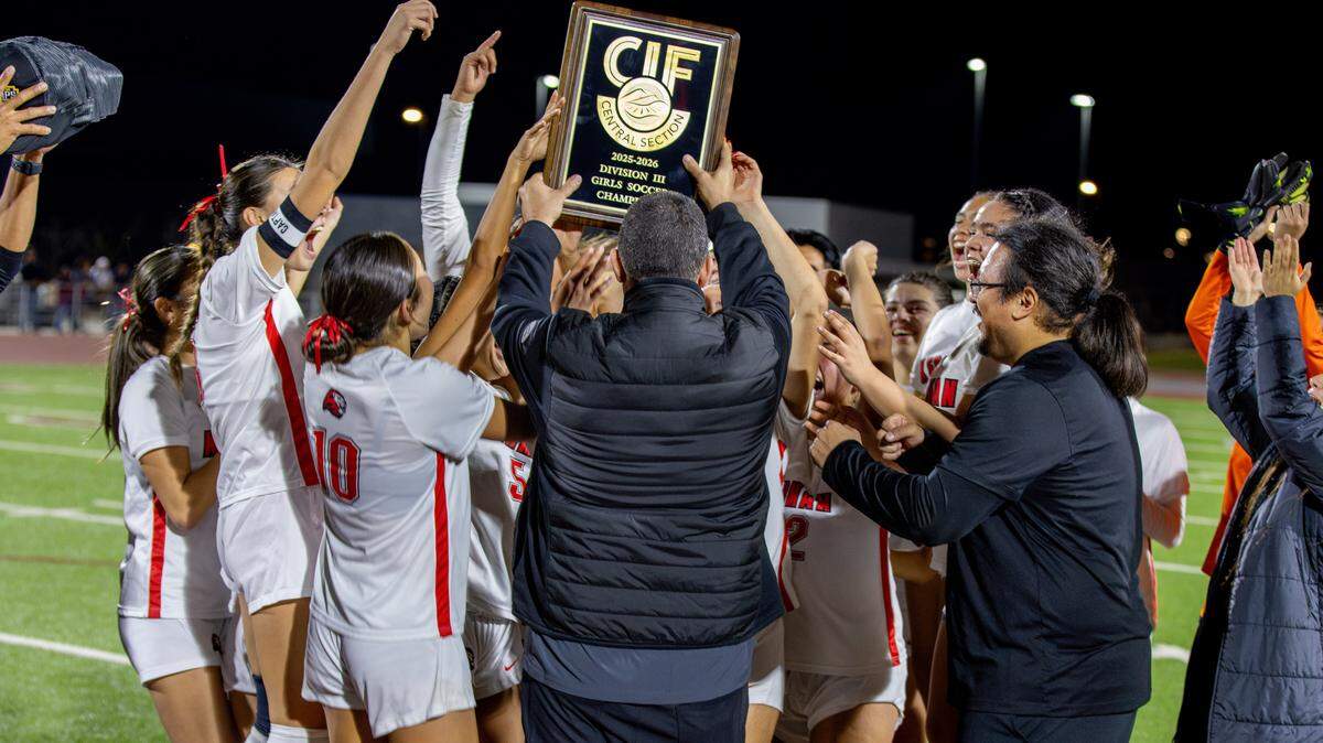 Kerman High celebrates a Central Section Division III title, winning on penalty kicks over Torres on Tuesday, Feb. 24, 2026.