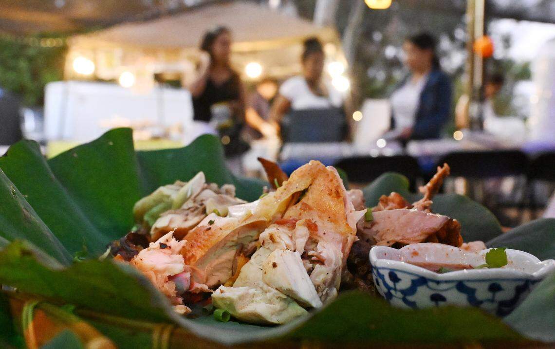 Food vendors offer food at Lotus Pond and Night Market which opened earlier this year celebrating the lotus flower and community. The night market. offering food, music and more, is located between Fresno and Sanger. Photographed Friday night, Oct. 10, 2025 near Sanger.