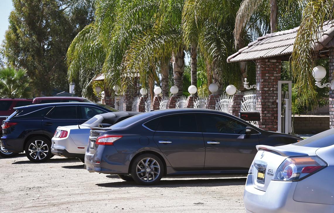 Cars are parked outside 9406 Breckenridge Road as family gathers to mourn two deaths at the home from Wednesday’s mass shooting. Photographed Thursday, Sept 13, 2018 in Bakersfield.