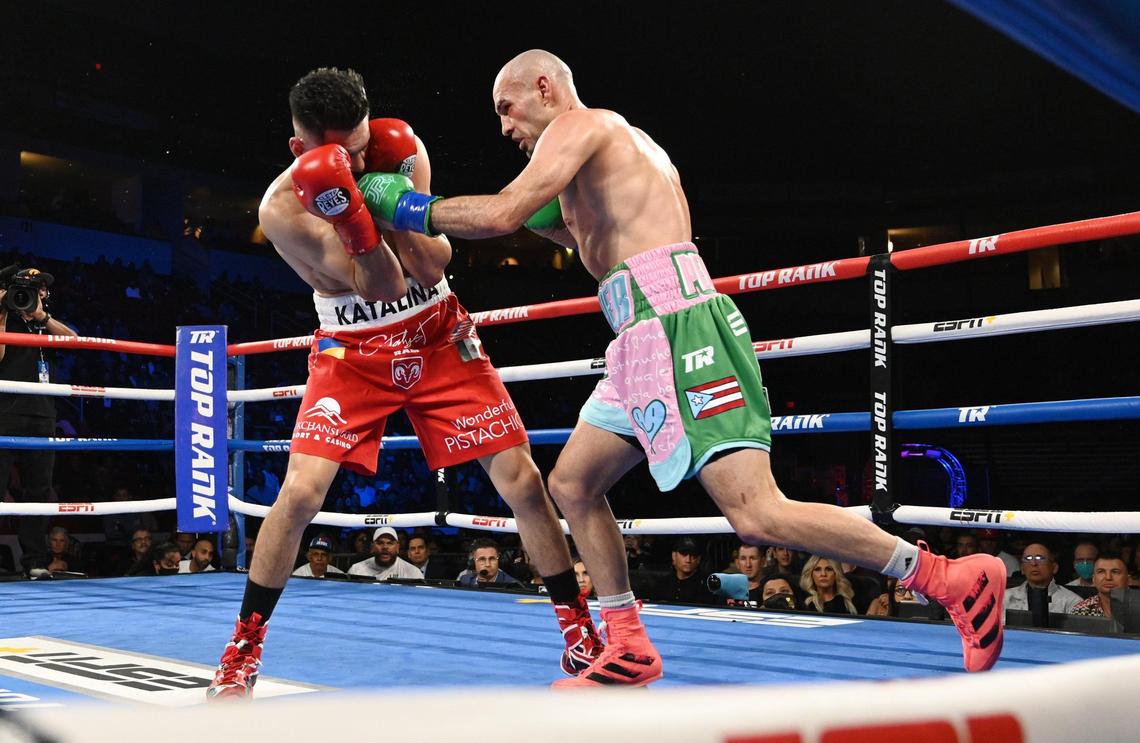 Jose Ramirez, left, tries to block a punch by Jose Pedraza during their junior welterweight fight at the Save Mart Center on Friday, March 4, 2022.