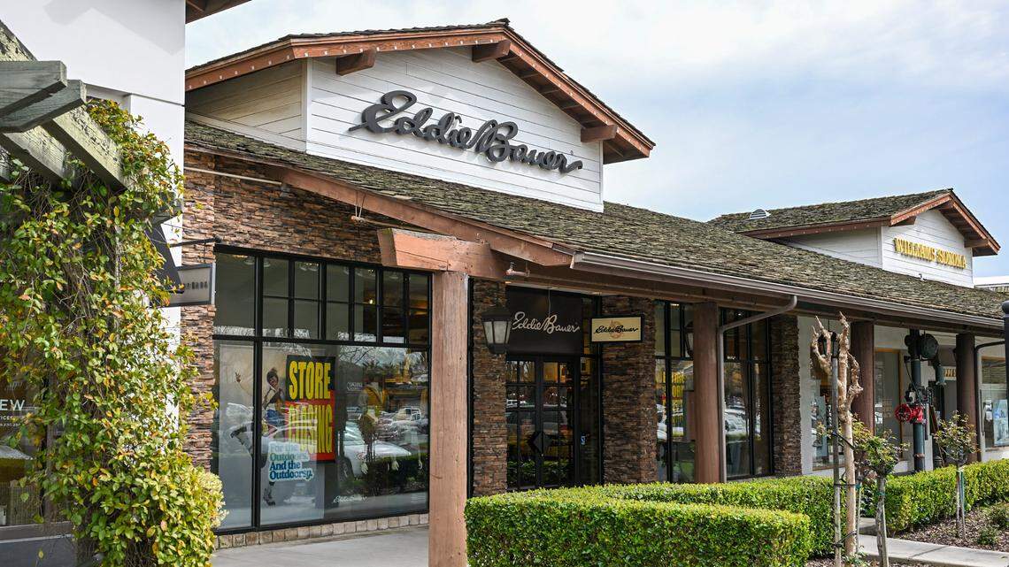A large store closing sign hangs in front of the Eddie Bauer store in Fig Garden Village on Tuesday, Feb. 24, 2026. The outdoor clothing brand located near Williams-Sonoma and Anthropologie is closing all its stores after filing for bankruptcy.