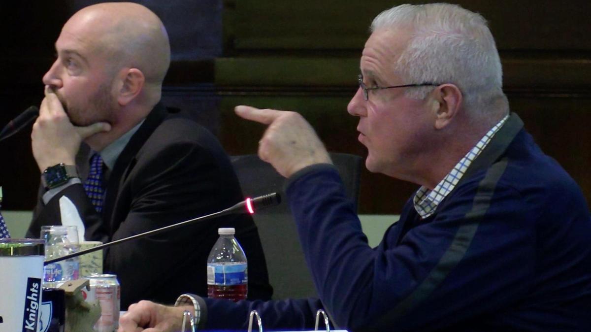 Fresno Unified School District trustee Terry Slatic, right, at his last board meeting, asks questions with board member Andy Levine to the left on Wednesday, Dec. 7, 2022 in Fresno. Slatic lost in the Nov. 8 election and will be replaced by retired FUSD school psychologist Susan Wittrup.