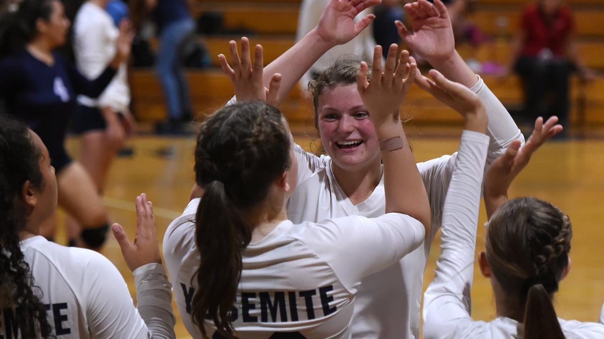 
Yosemite’s Monique Ades, center, comes off the court in the match against Bullard on Thursday, Sept. 6, 2018 in Oakhurst.
