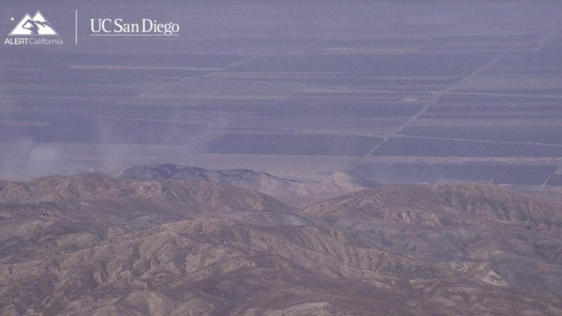 A fast-moving wildfire ignited Sunday in western Fresno County, burning approximately 200 acres near the Tumey Hills Recreation Area.