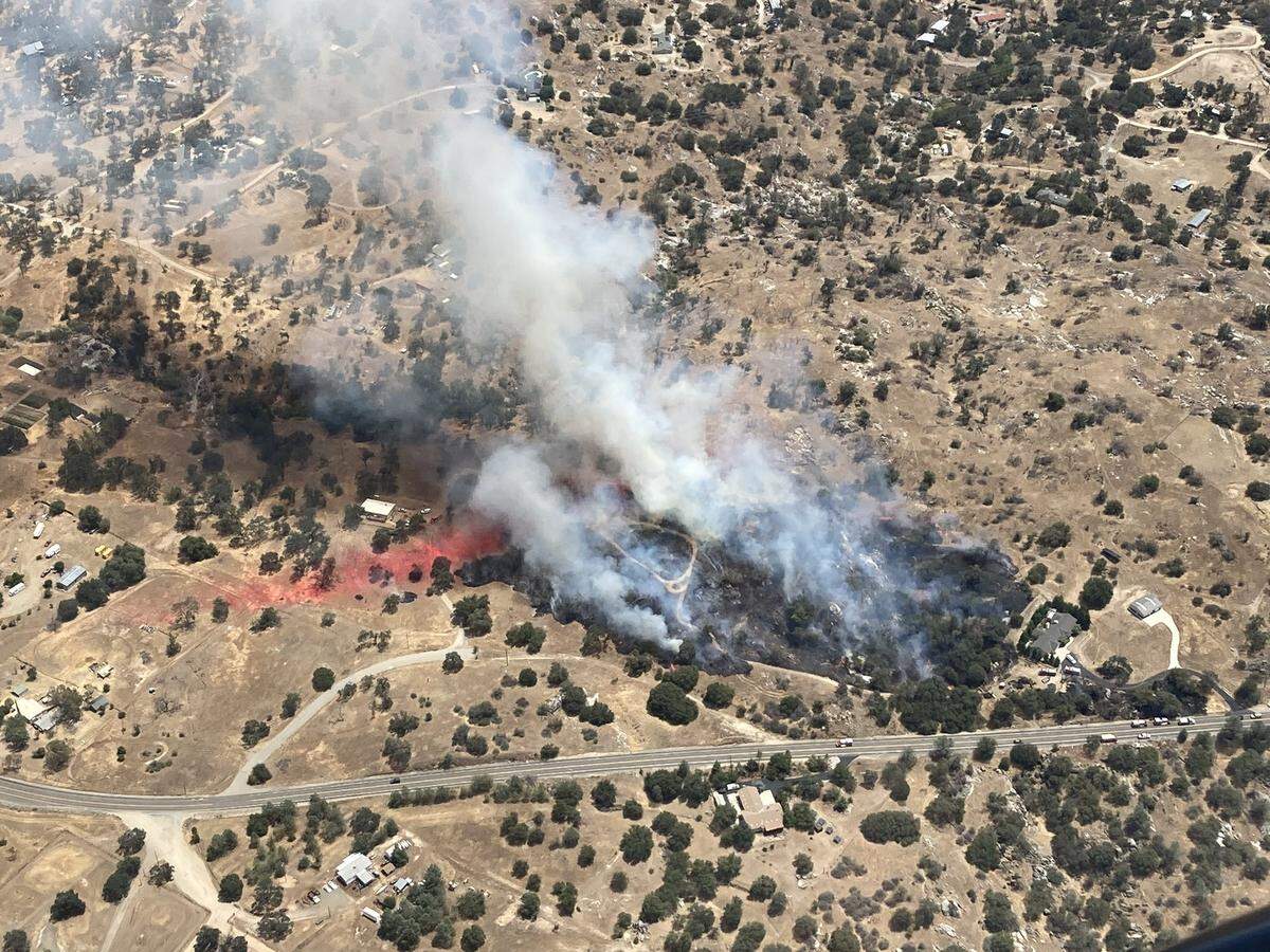 Crews are battling a wildfire in Fresno County that is at 10 acres on Friday afternoon.