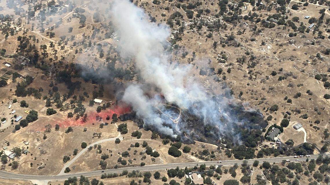 Crews are battling a wildfire in Fresno County that is at 10 acres on Friday afternoon.